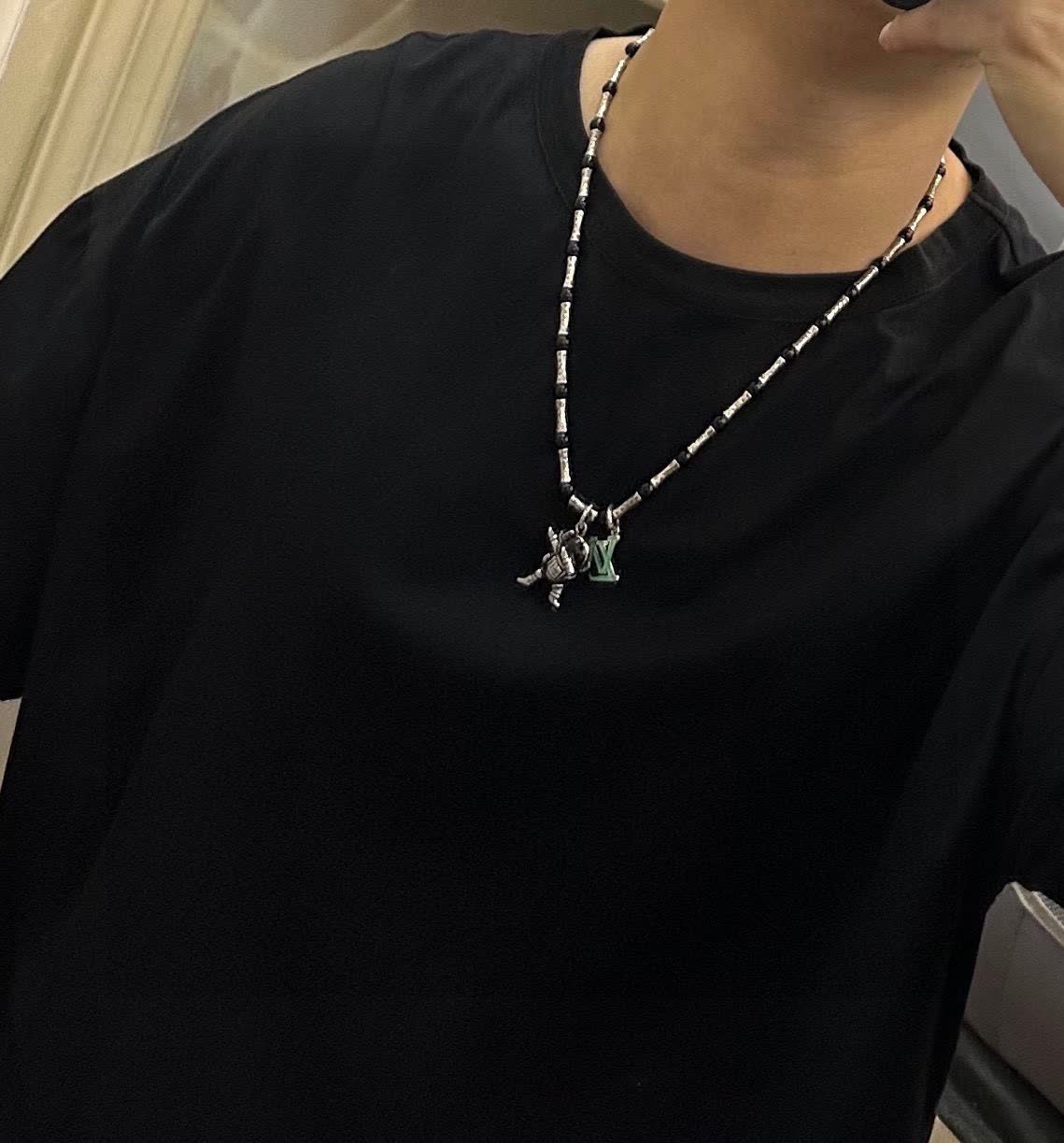 Louis Vuitton Silver and Black Beaded Necklace with Astronaut Charm